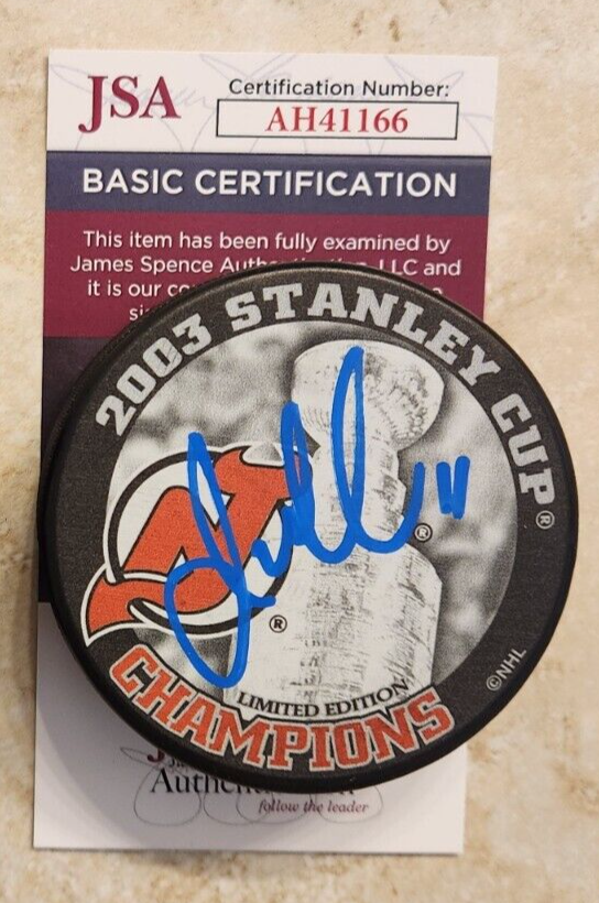 JOHN MADDEN SIGNED 2003 STANLEY CUP CHAMPIONS PUCK W/ JSA COA #AH41166 NJ DEVILS COLLECTIBLE MEMORABILIA