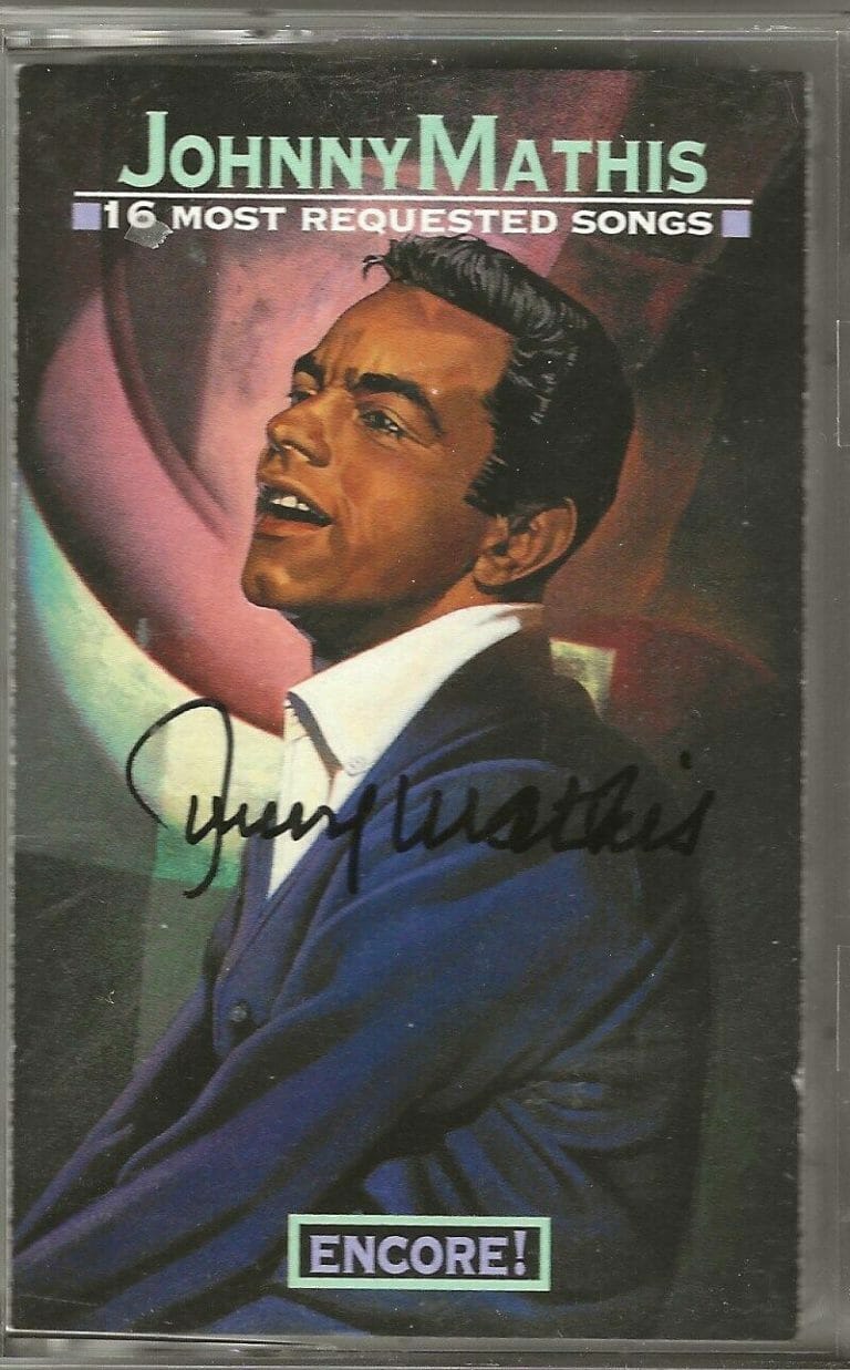 JOHNNY MATHIS REAL HAND SIGNED 16 MOST REQUESTED SONGS CASSETTE TAPE COA
 COLLECTIBLE MEMORABILIA