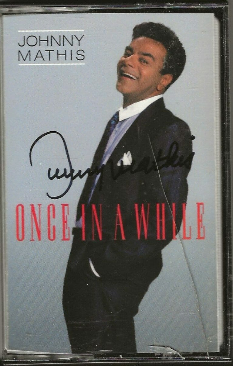 JOHNNY MATHIS REAL HAND SIGNED ONCE IN A WHILE CASSETTE TAPE COA
 COLLECTIBLE MEMORABILIA