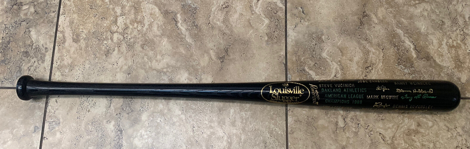 1988 OAKLAND A’S H&B AMERICAN LEAGUE CHAMPIONS BLACK BASEBALL BAT MARK MCGWIRE COLLECTIBLE MEMORABILIA