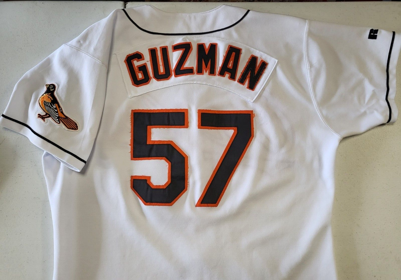 JUAN GUZMAN BALTIMORE ORIOLES #57 GAME USED WHITE RUSSELL JERSEY AUTHENTIC
