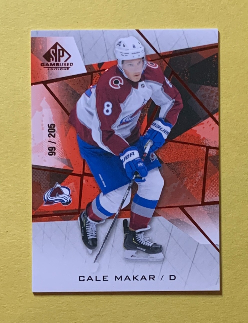 2021-22 UPPER DECK SP GAME USED CALE MAKAR RED /205 #8 AVALANCHE
