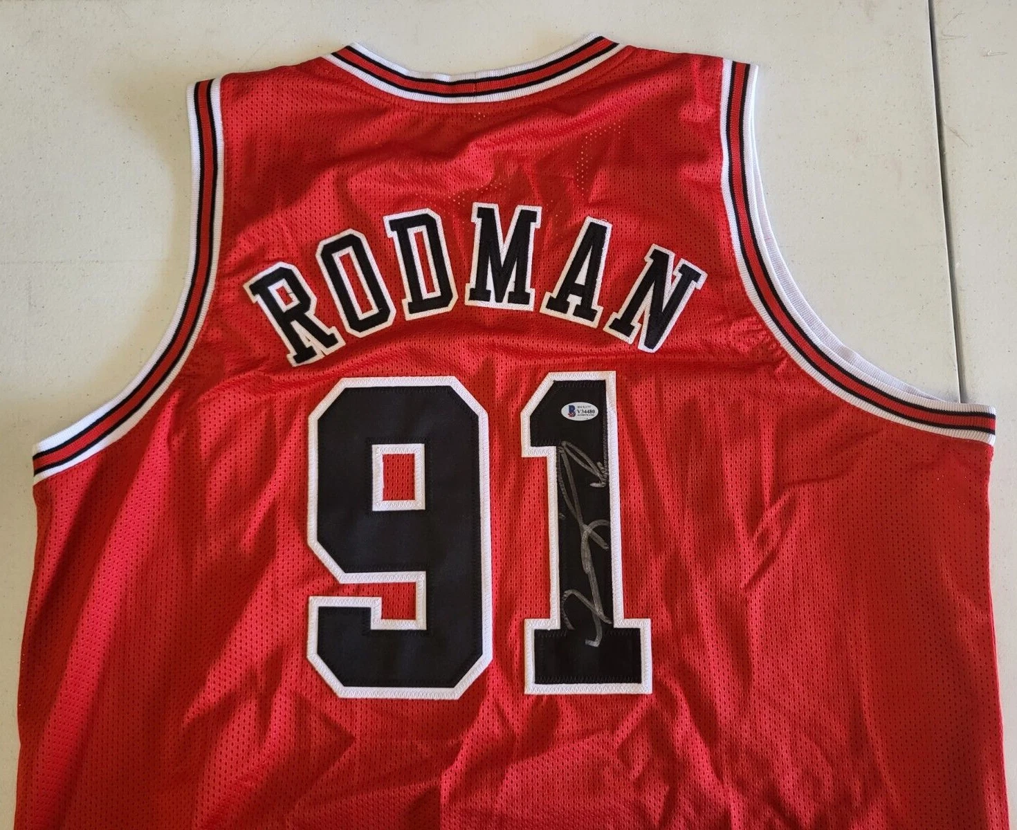 DENNIS RODMAN CHICAGO BULLS #91 SIGNED AUTOGRAPH BASKETBALL JERSEY BECKETT AUTH
