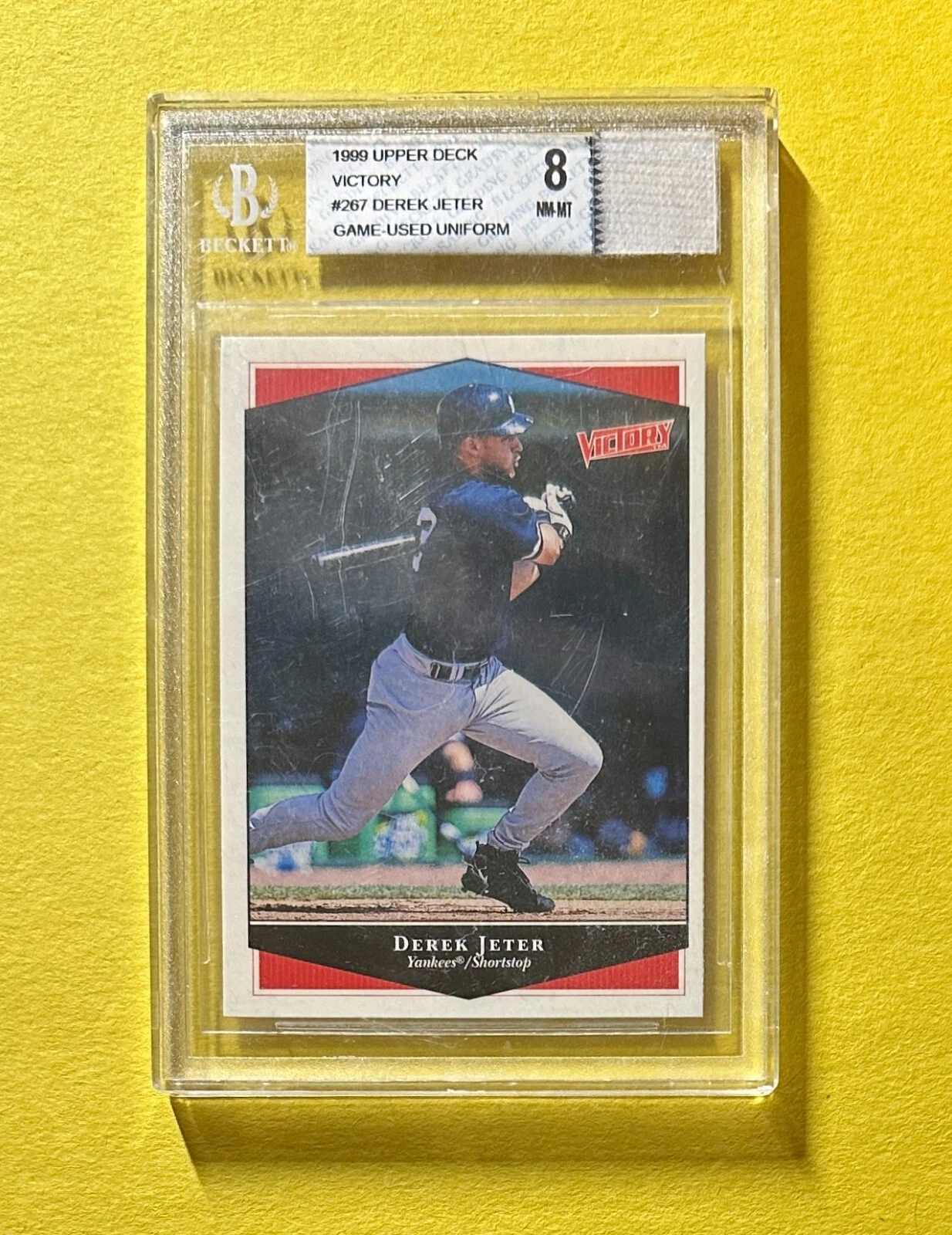 1999 UPPER DECK VICTORY DEREK JETER GAME-USED UNIFORM #267 BGS NM-MT 8 YANKEES
