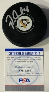 BRIAN DUMOULIN SIGNED AUTOGRAPHED PITTSBURGH PENGUINS LOGO HOCKEY PUCK PSA/DNA
 COLLECTIBLE MEMORABILIA