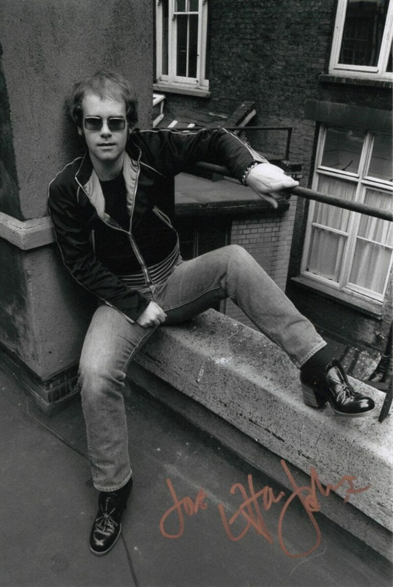 ELTON JOHN SIGNED AUTOGRAPH 8×12 PHOTO GOODBYE YELLOW BRICK ROAD ICON W/ JSA COA
 COLLECTIBLE MEMORABILIA