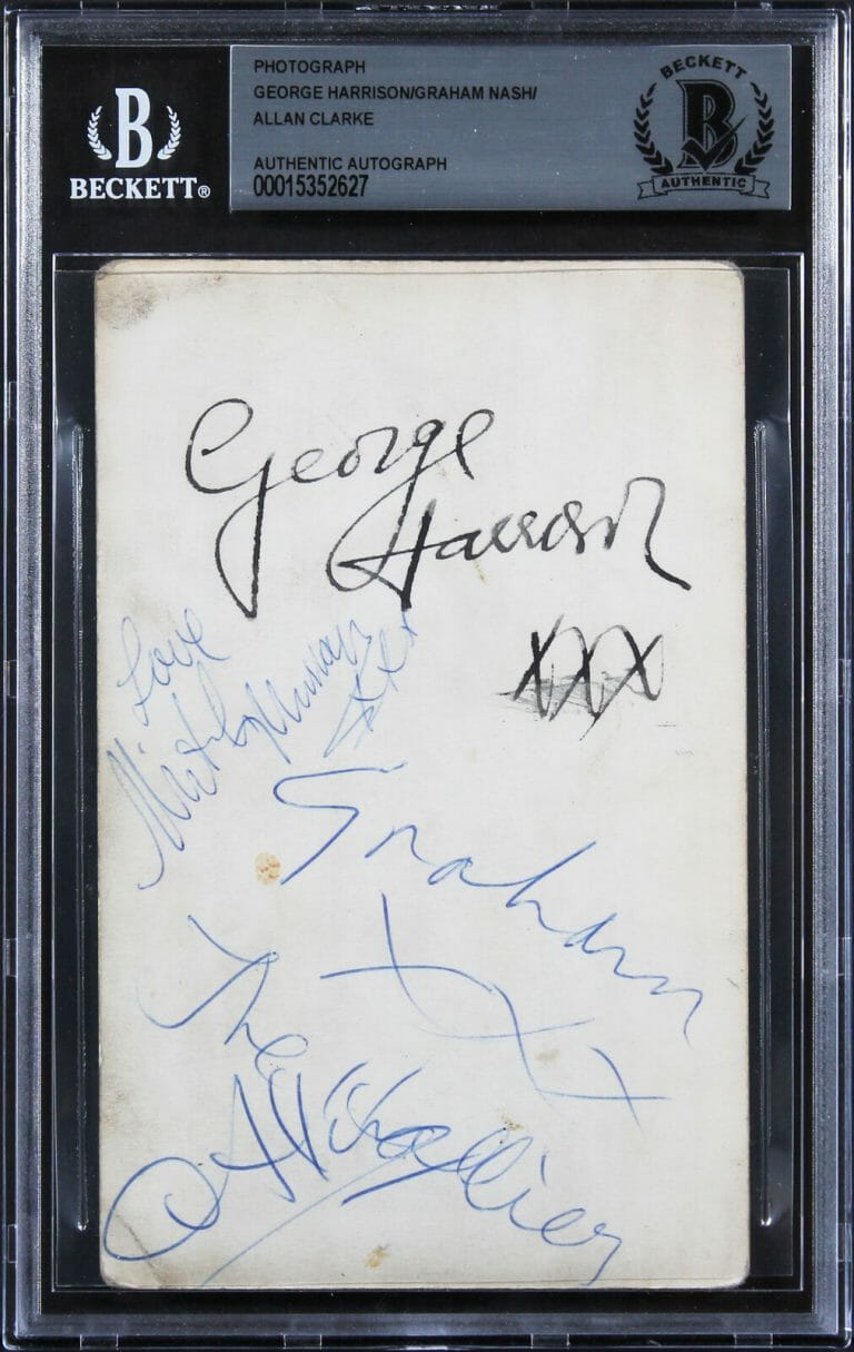GEORGE HARRISON, GRAHAM NASH & ALLAN CLARKE SIGNED 3.5×5.5 PHOTO BAS SLABBED
 COLLECTIBLE MEMORABILIA