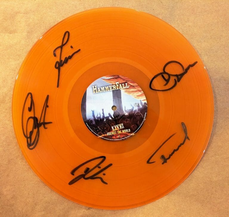 HAMMERFALL REAL SIGNED LIVE AGAINST THE WORLD VINYL DISC ORANGE COA AUTOGRAPHED
 COLLECTIBLE MEMORABILIA