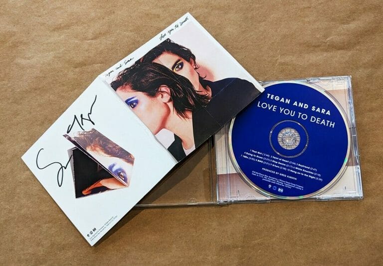 TEGAN AND SARA REAL HAND SIGNED LOVE YOU TO DEATH CD #2 COA AUTOGRAPHED BY BOTH
 COLLECTIBLE MEMORABILIA