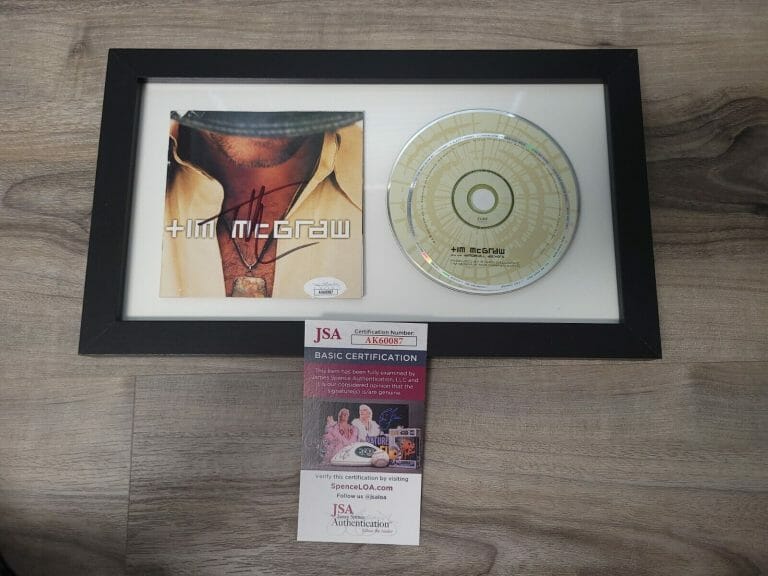TIM MCGRAW FRAMED AUTOGRAPHED AND THE DANCEHALL DOCTORS SIGNED JSA AUTHENTICATED
 COLLECTIBLE MEMORABILIA
