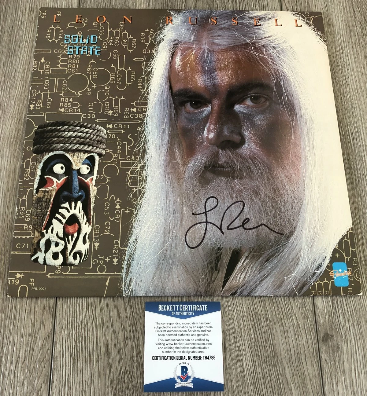 LEGEND LEON RUSSELL SIGNED AUTOGRAPH SOLID STATE ALBUM w/PROOF & BECKETT BAS COA
