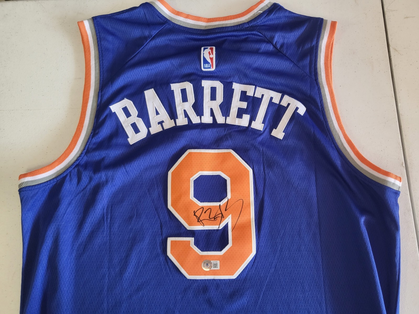 RJ BARRETT #9 NEW YORK KNICKS SIGNED AUTOGRAPHED JERSEY SZ XL BECKETT STICKER
