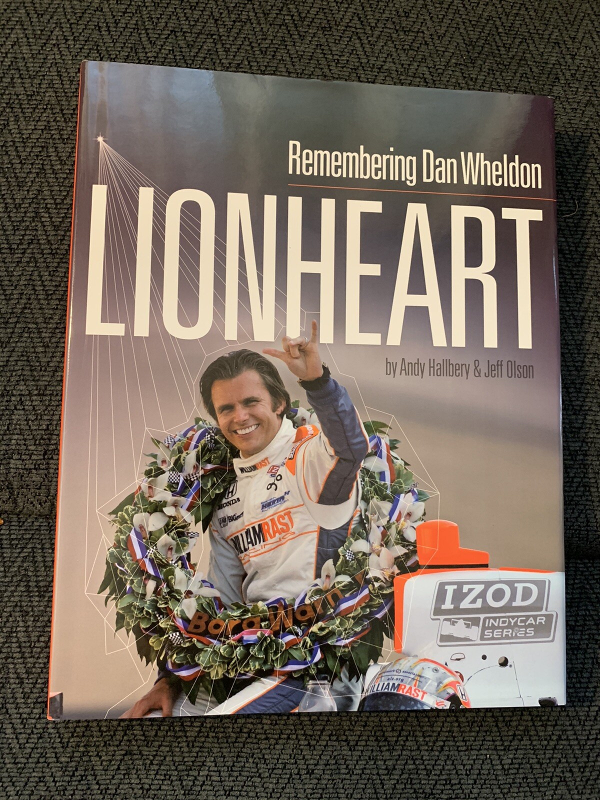 Remembering Dan Wheldon: LionHeart Signed By Bobby Unser Hardcover Book Indy 500

