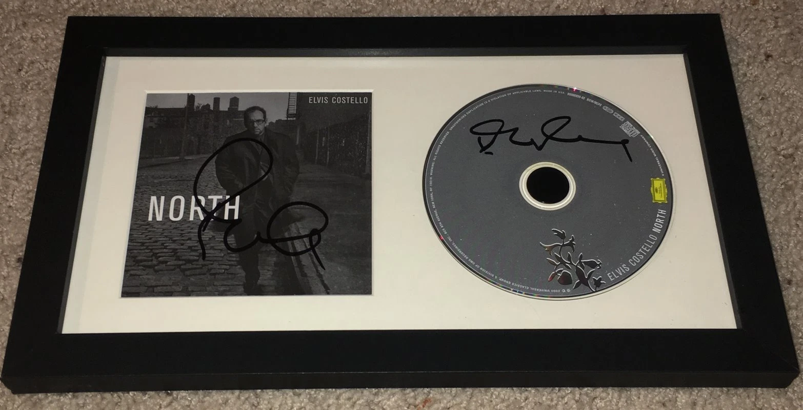 ELVIS COSTELLO TWICE 2X SIGNED AUTOGRAPH NORTH FRAMED CD & BOOKLET w/EXACT PROOF
