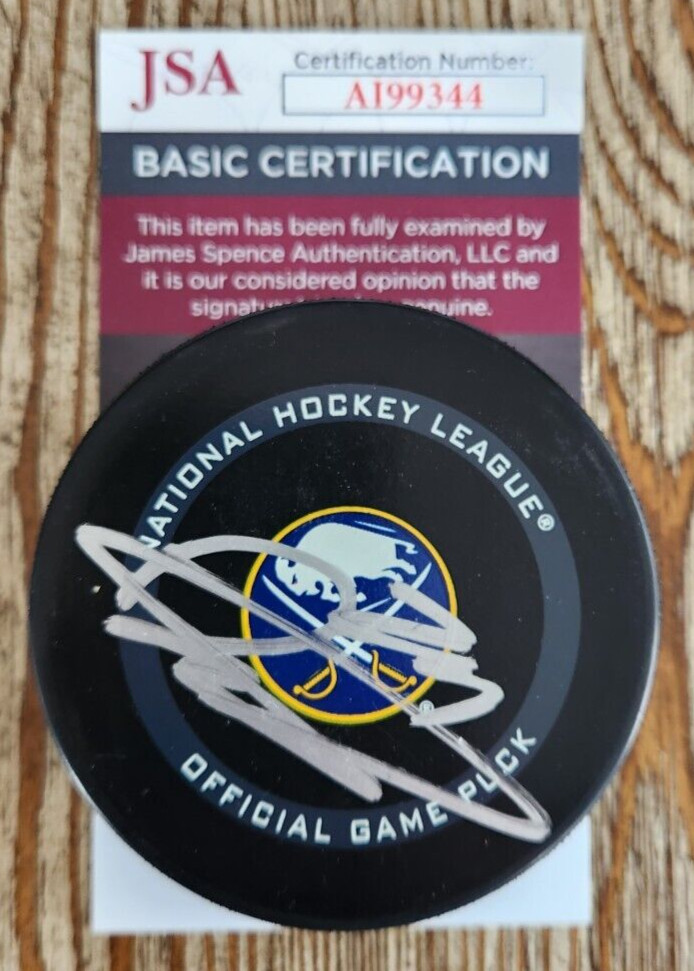 Dylan Cozens Signed Official NHL Game Puck w/ JSA COA #AI99344 Buffalo Sabres
