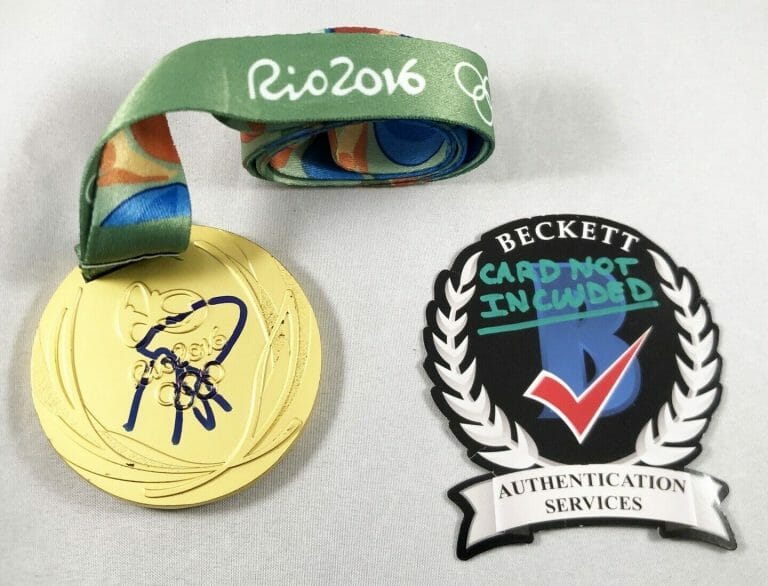 MONICA PUIG SIGNED RIO 2016 GOLD MEDAL BECKETT BAS 1ST EVER PUERTO RICO 1 COA
 COLLECTIBLE MEMORABILIA