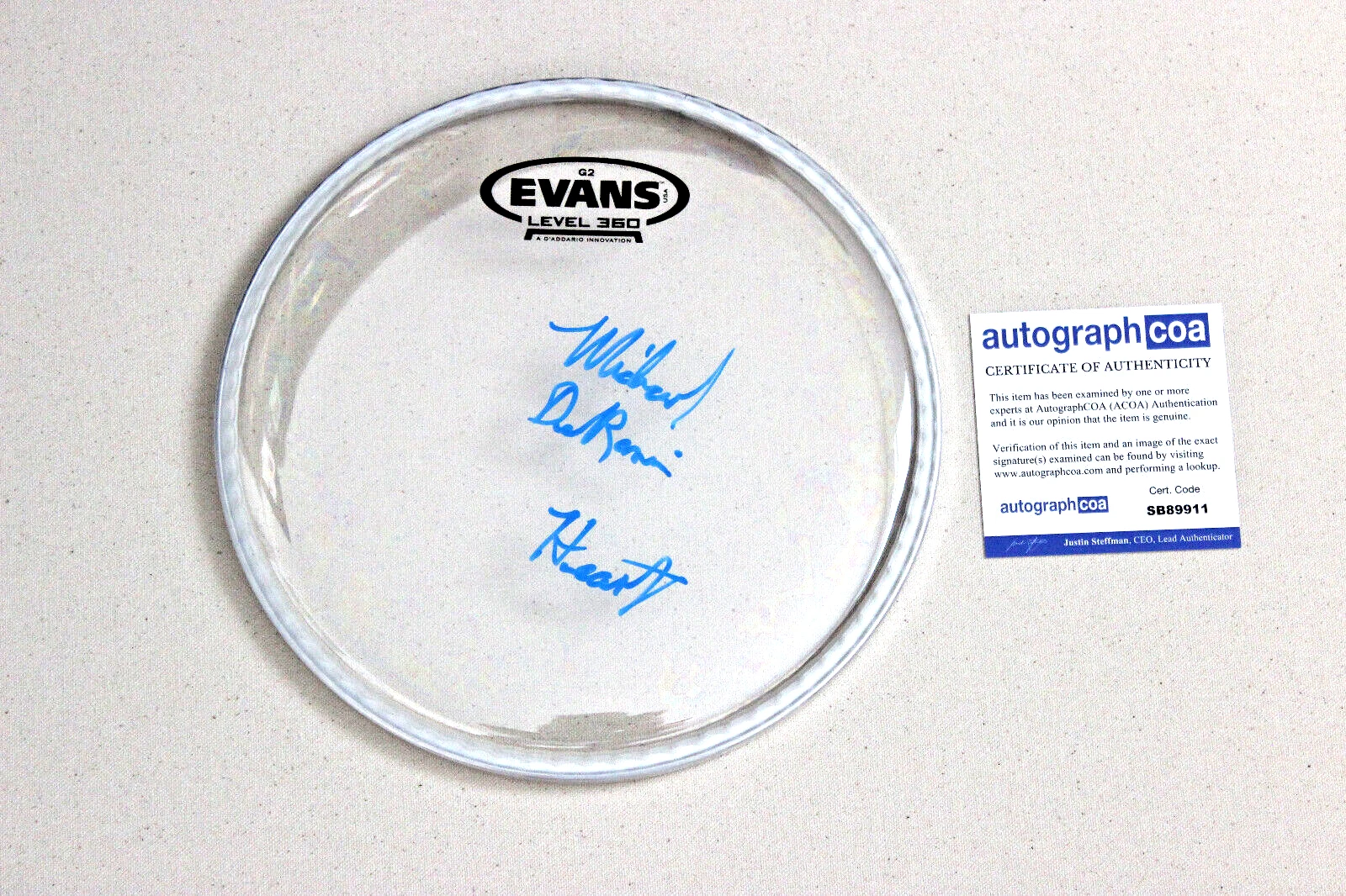 MICHAEL DEROSIER OF HEART (BAND) SIGNED 8″ DRUM HEAD W/ HEART INSC ACOA
 COLLECTIBLE MEMORABILIA