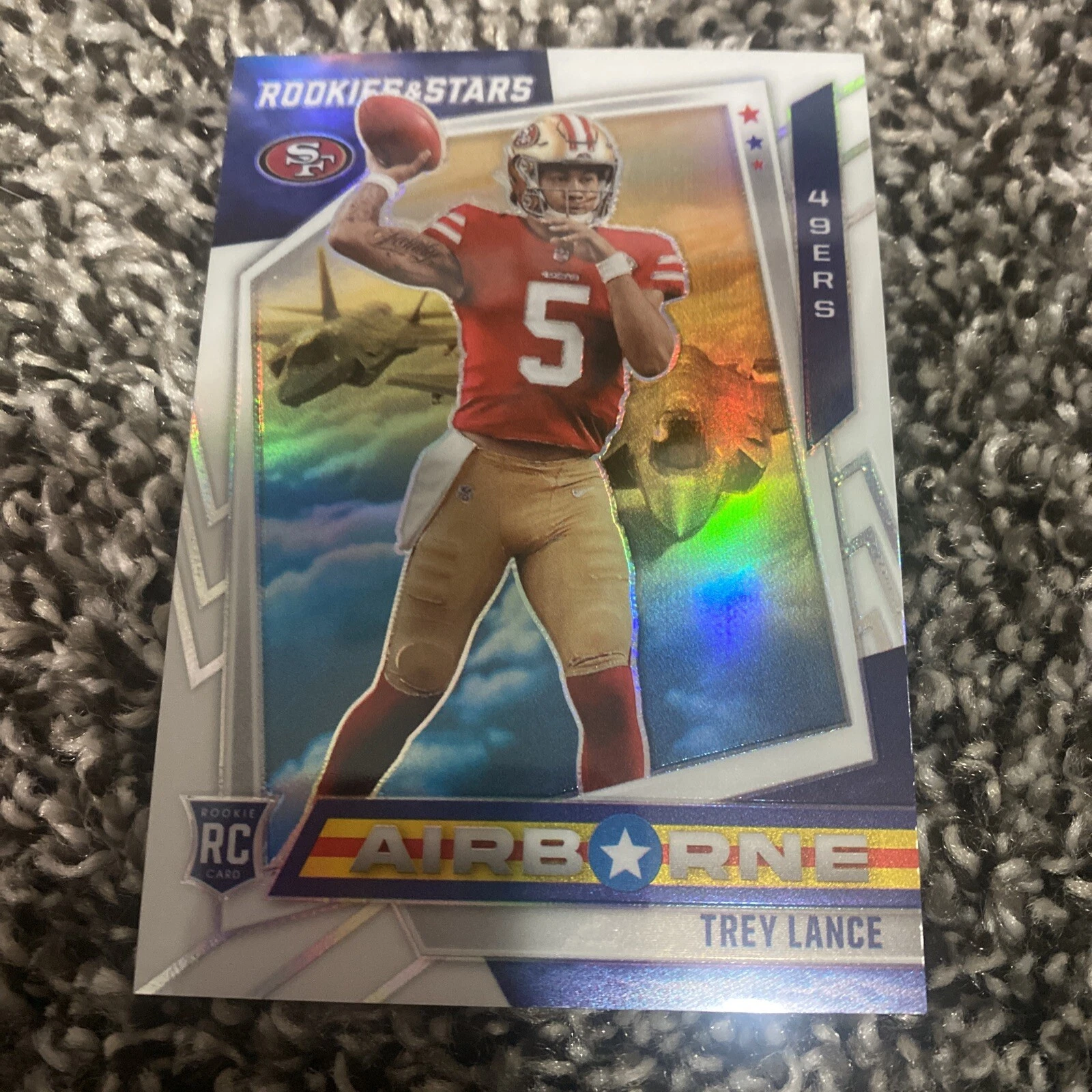 2021 Panini Rookies and Stars Trey Lance rookie airborne white #103/149 SP 49ers
