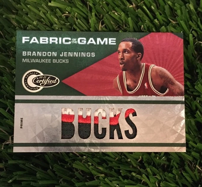 2010-11 CERTIFIED FABRIC OF THE GAME JERSEY BRANDON JENNINGS #D /25
