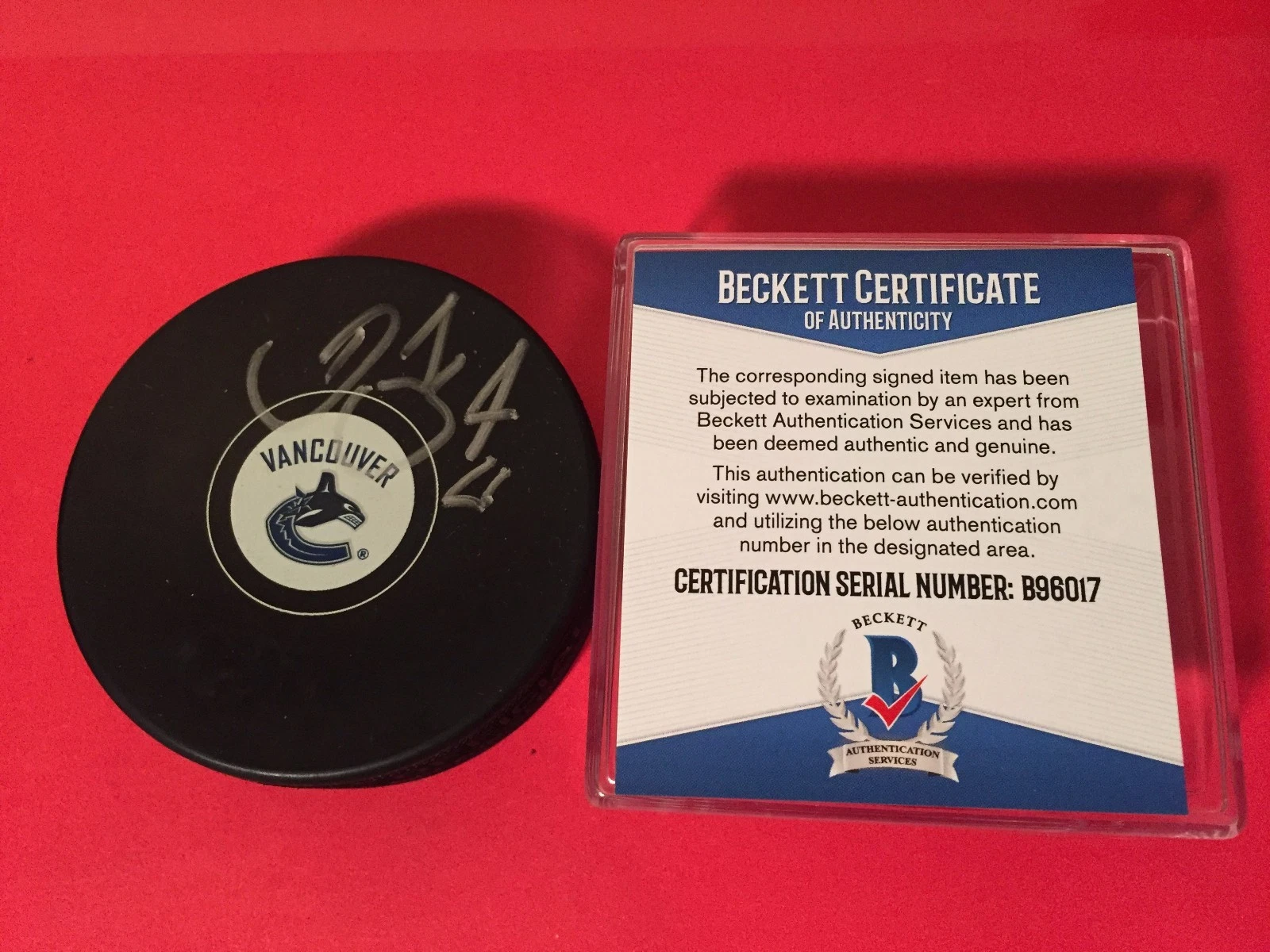 Daniel Sedin Canucks Hockey Signed Puck Auto Beckett BAS COA
