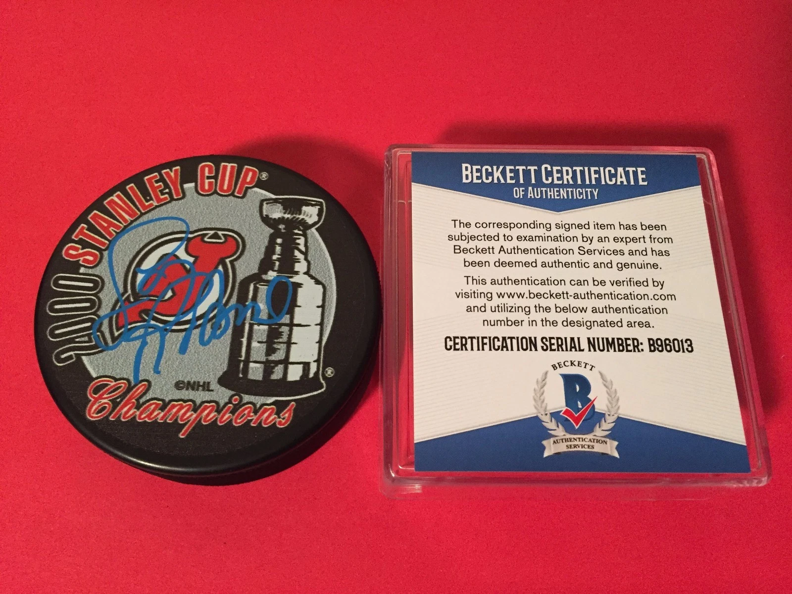 Larry Robinson HOF 2000 Stanley Cup Champions Signed Puck Auto Beckett BAS COA
