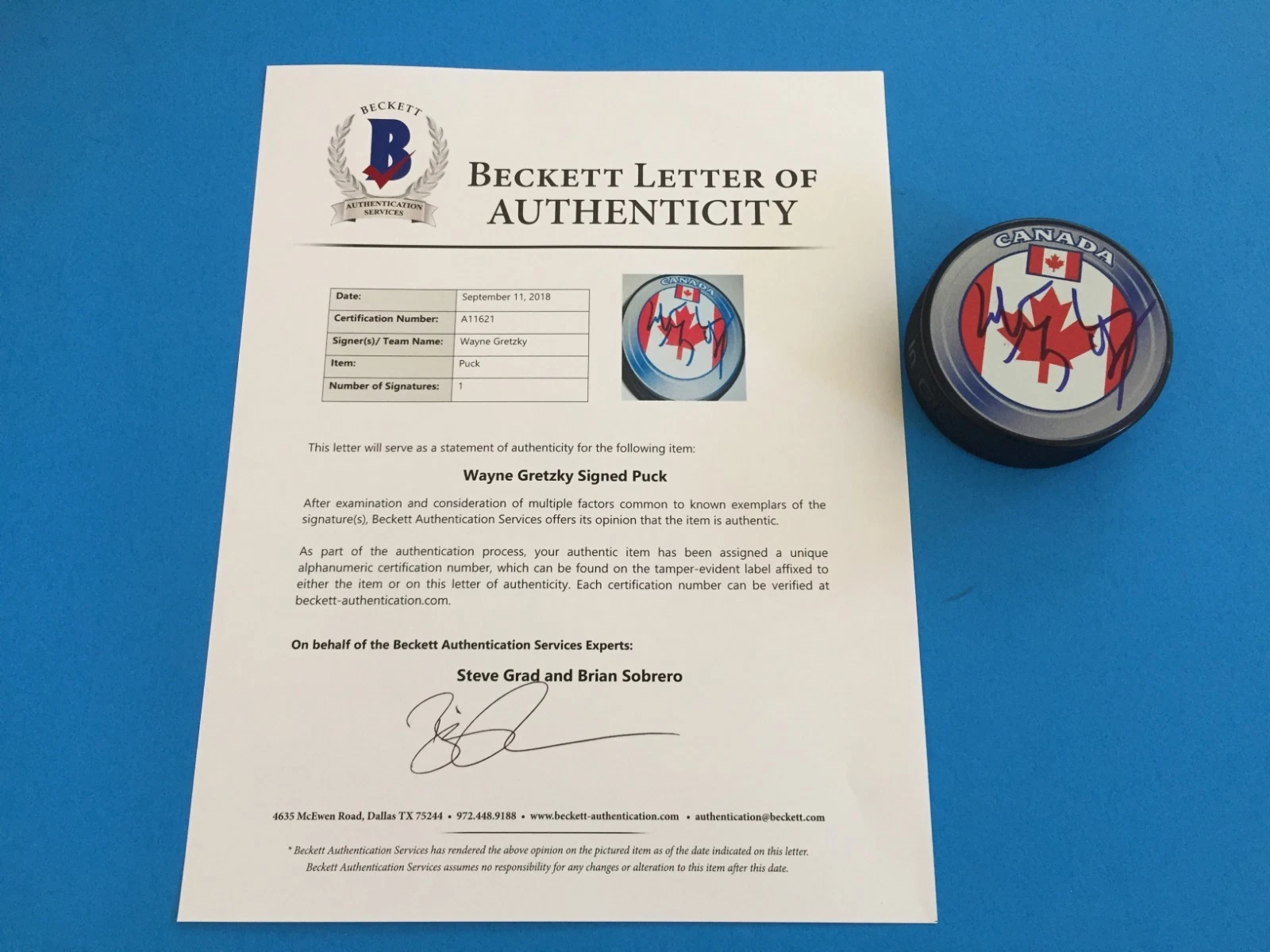 Wayne Gretzky Canada Flag Signed Puck Auto Beckett BAS LOA Letter COA
