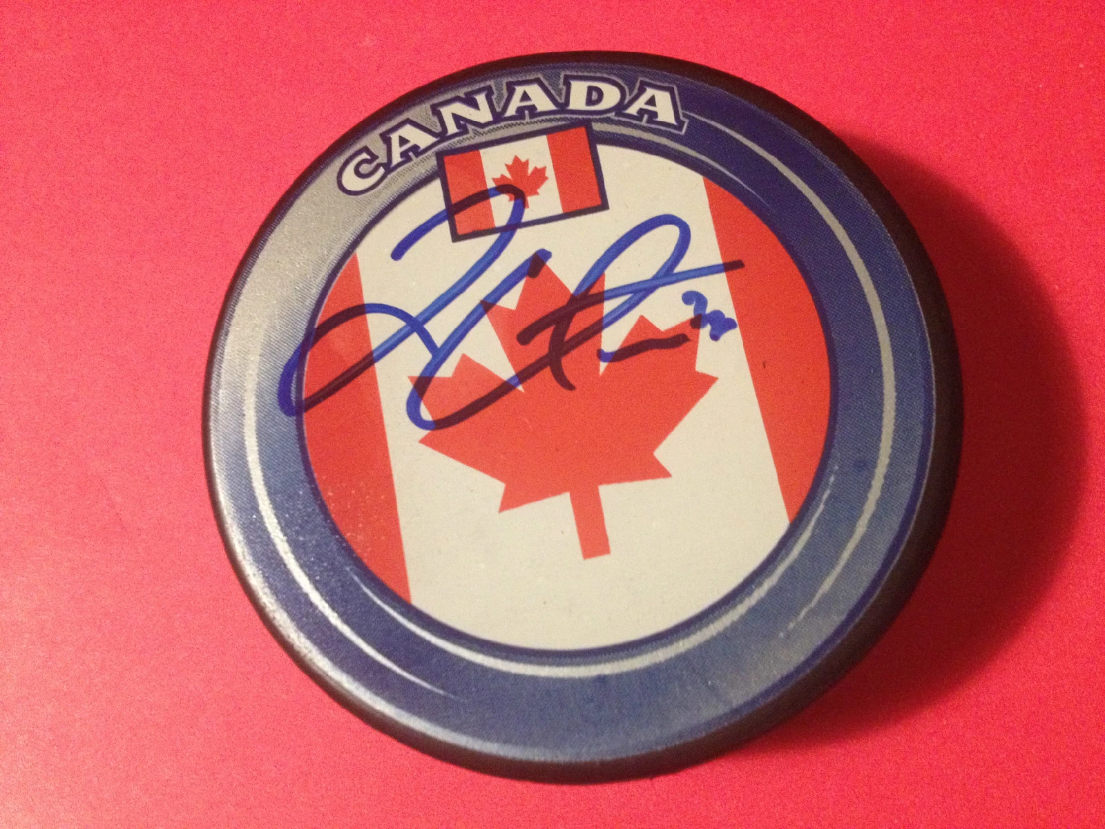 Logan Couture Sharks Team Canada Signed Puck 