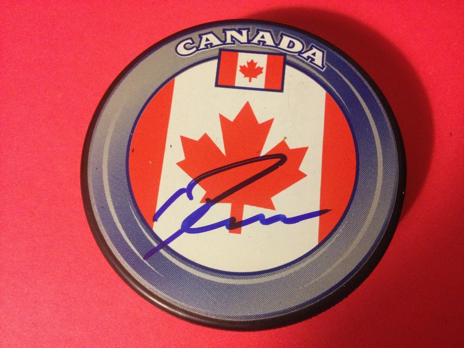 Ryan Nugent-Hopkins Oilers Team Canada Flag Signed Puck Auto
