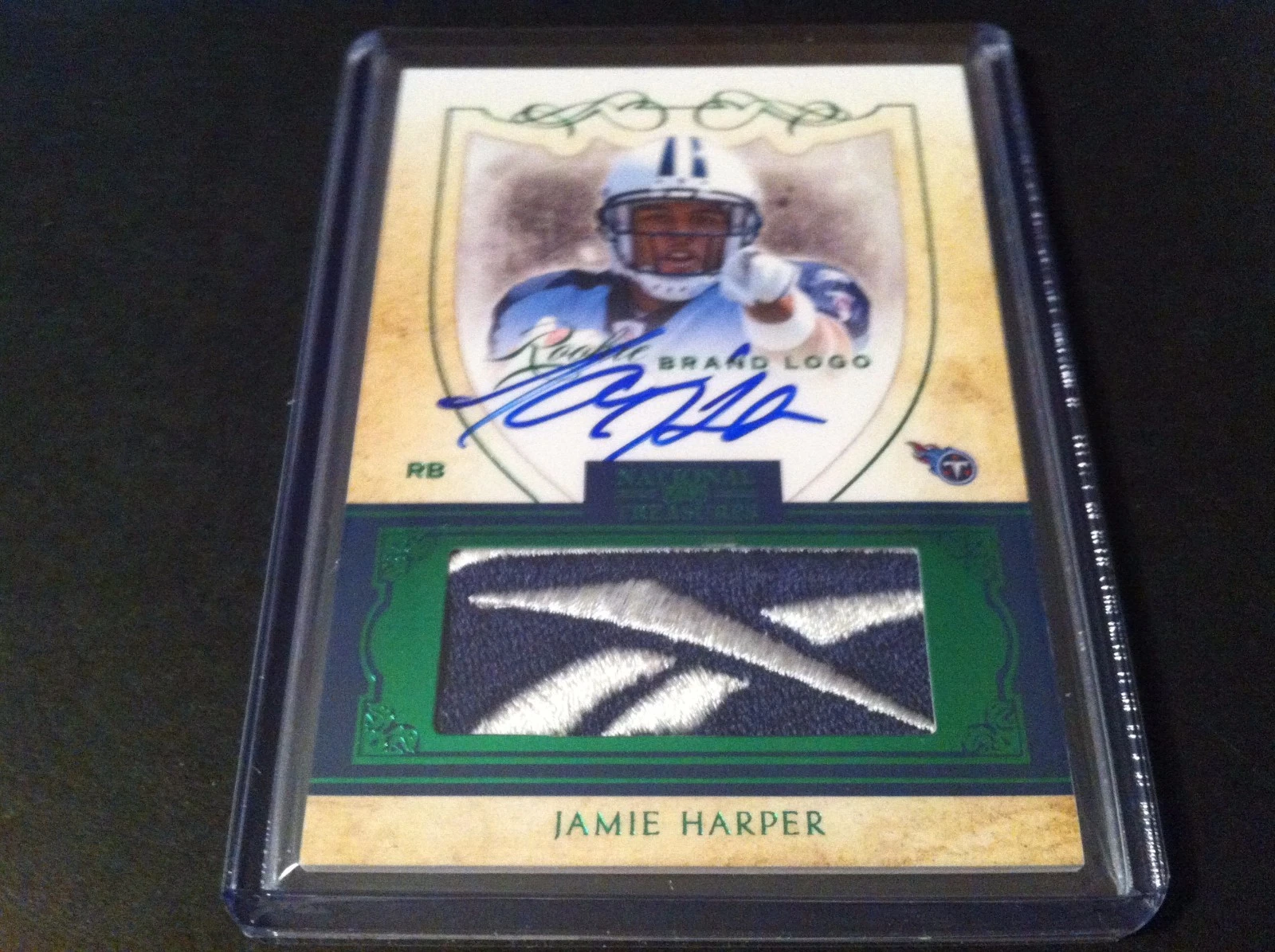 Titus Young 2011 National Treasures Rookie Reebok Logo Patch Jersey Auto /10
