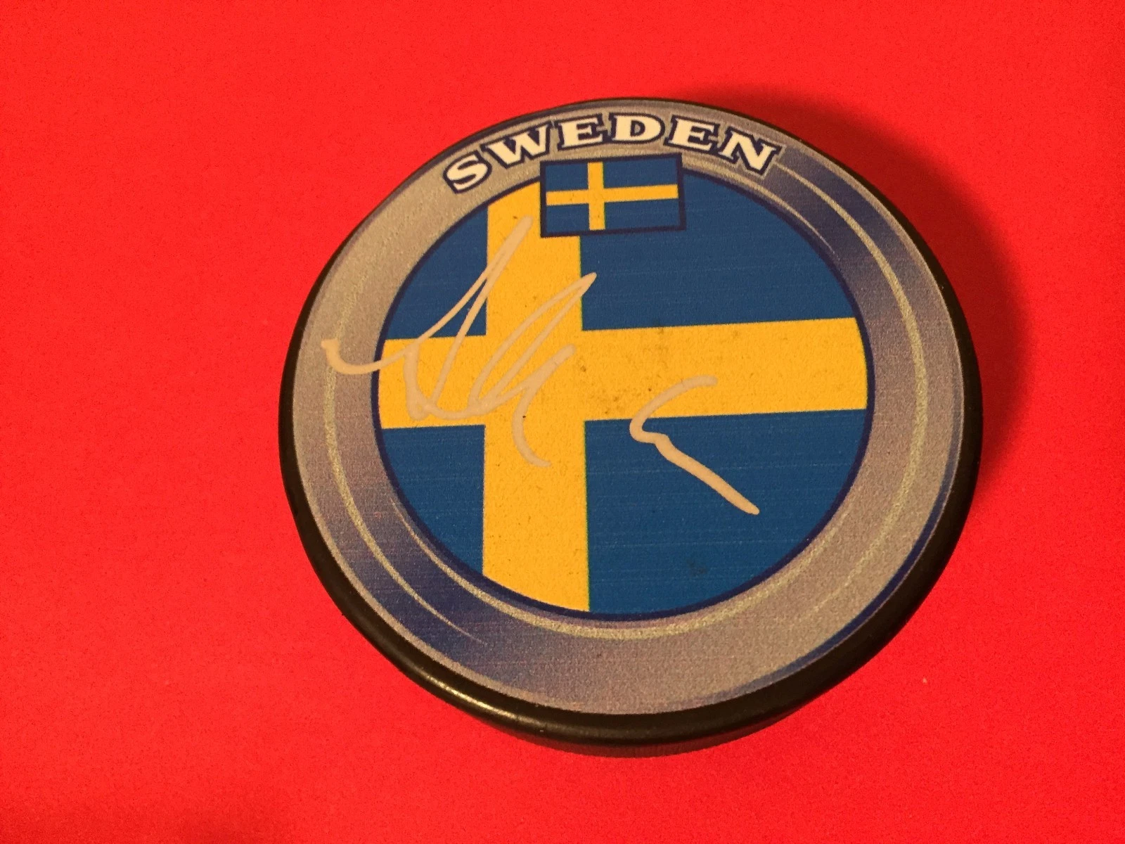Alexander Edler Canucks Team Sweden Flag Signed Auto Puck
