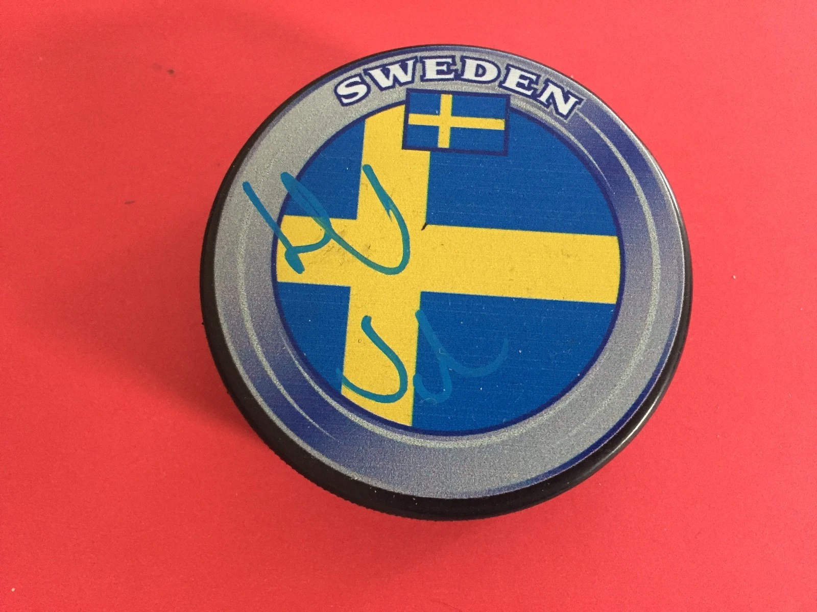 Henrik Sedin Canucks Team Sweden Flag Signed Auto Puck
