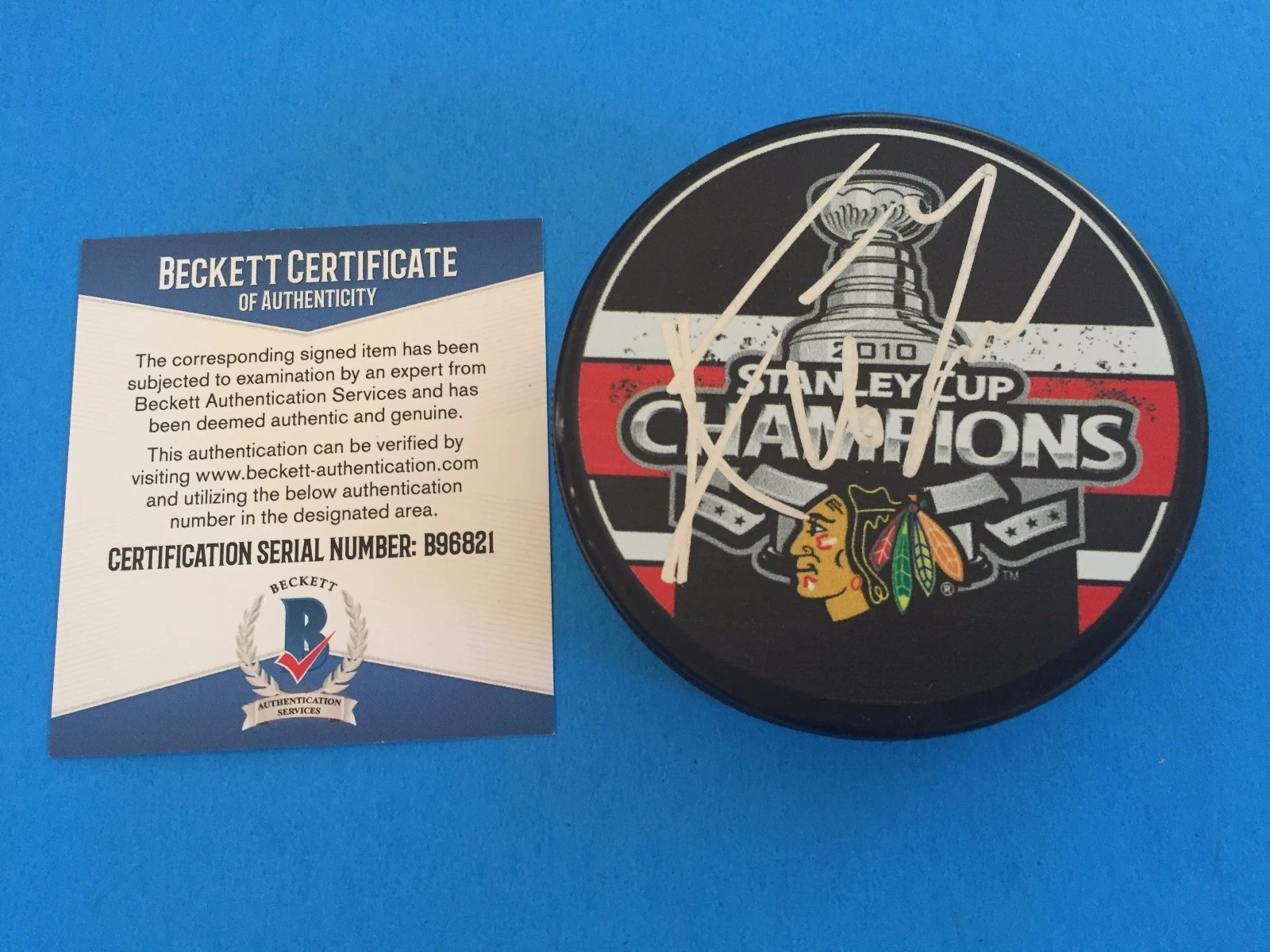 Andrew Ladd 2010 Stanley Cup Champions Puck Signed Auto Beckett BAS COA
