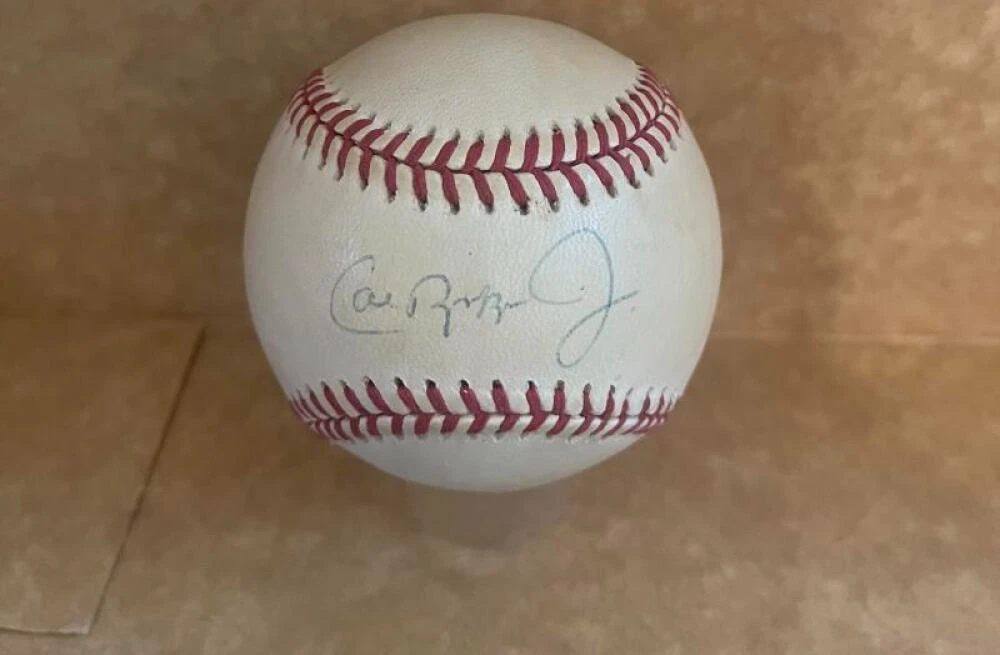 CAL RIPKEN JR. ORIOLES SIGNED VINTAGE A.L. BASEBALL BECKETT AUTH
