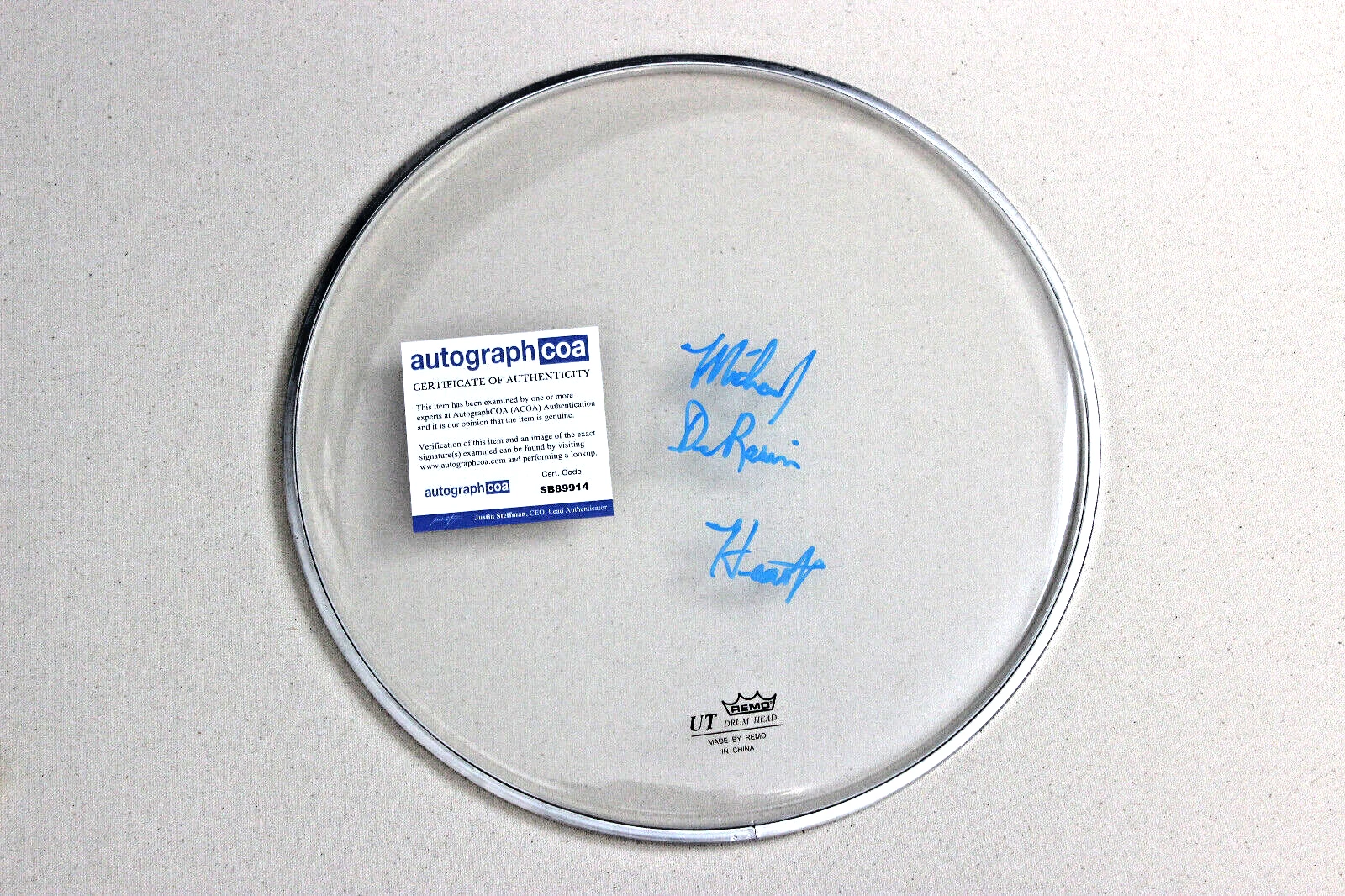 MICHAEL DEROSIER OF HEART (BAND) SIGNED 12″ DRUM HEAD W/ HEART INSC ACOA
 COLLECTIBLE MEMORABILIA