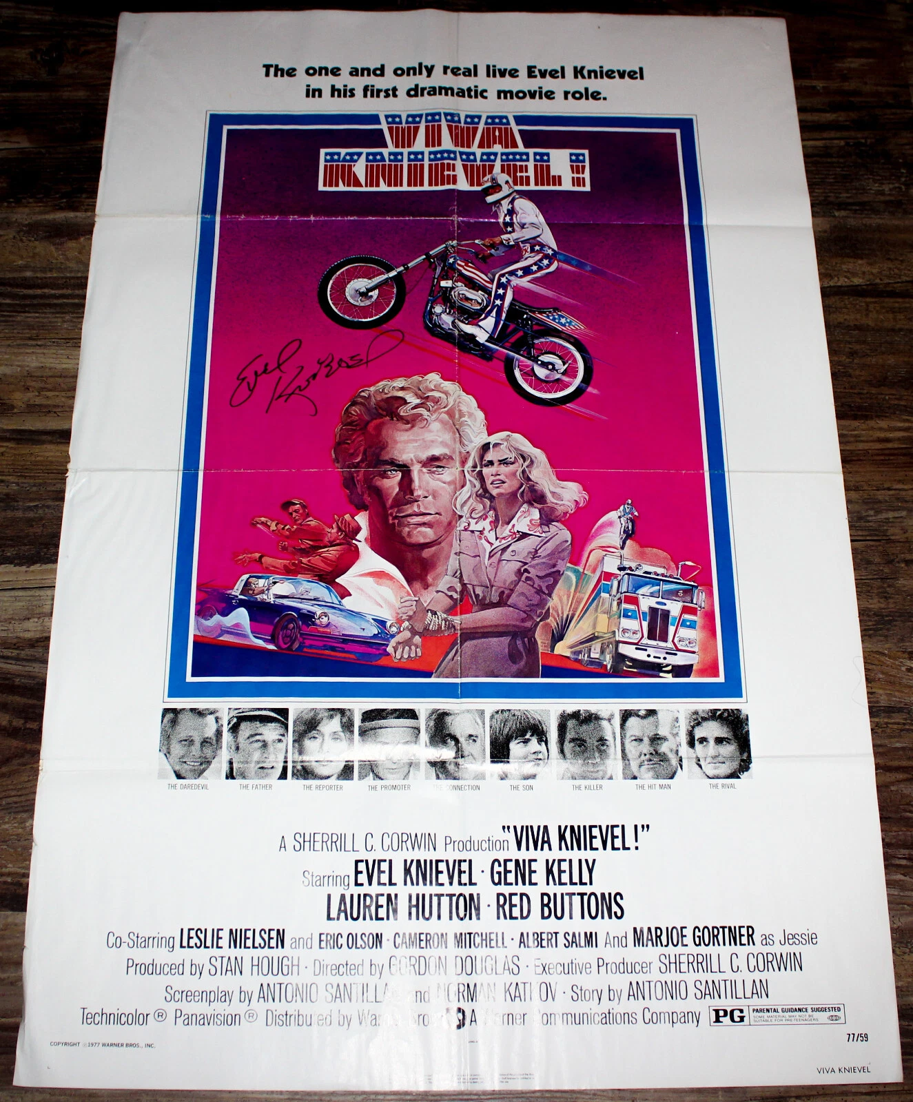EVIL KNIEVEL 1977 AUTOGRAPHED ONE SHEED FOLD MOVIE POSTER FOR VIVA KNIEVEL!!
 COLLECTIBLE MEMORABILIA