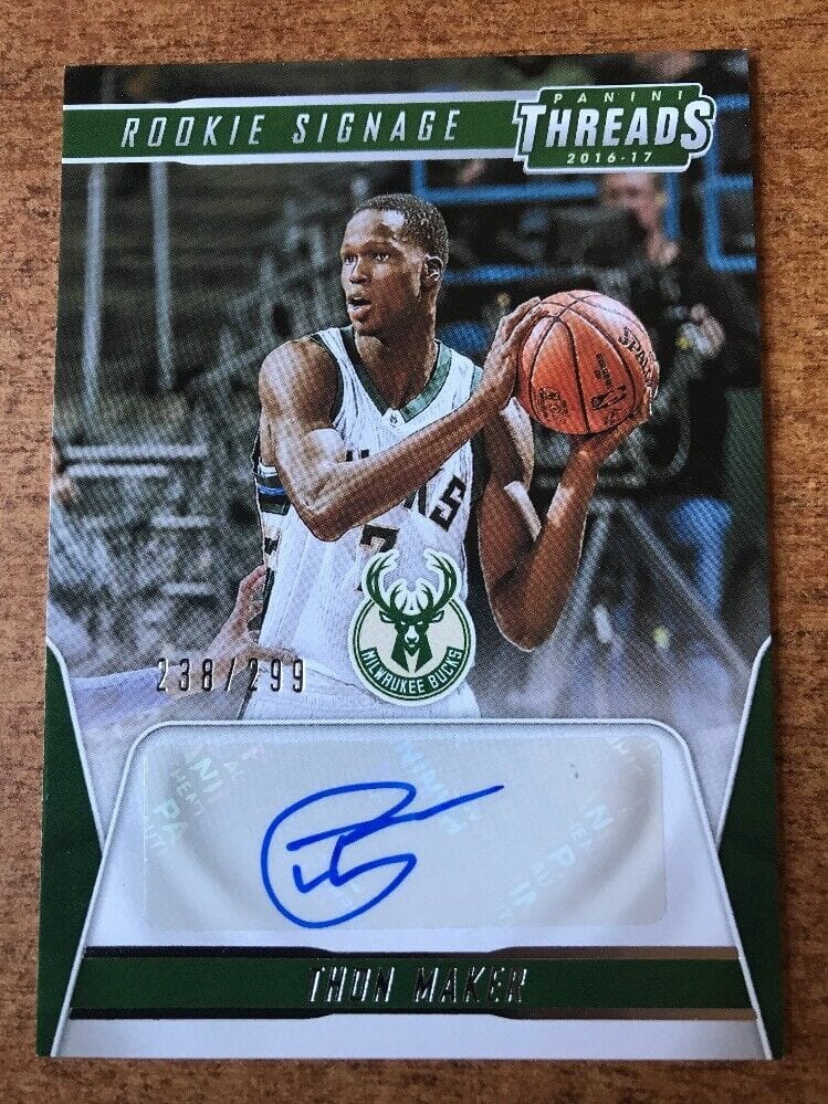 BUCKS THON MAKER 2016-17 PANINI THREADS ROOKIE SINAGE AUTO RC #238/299
 COLLECTIBLE MEMORABILIA