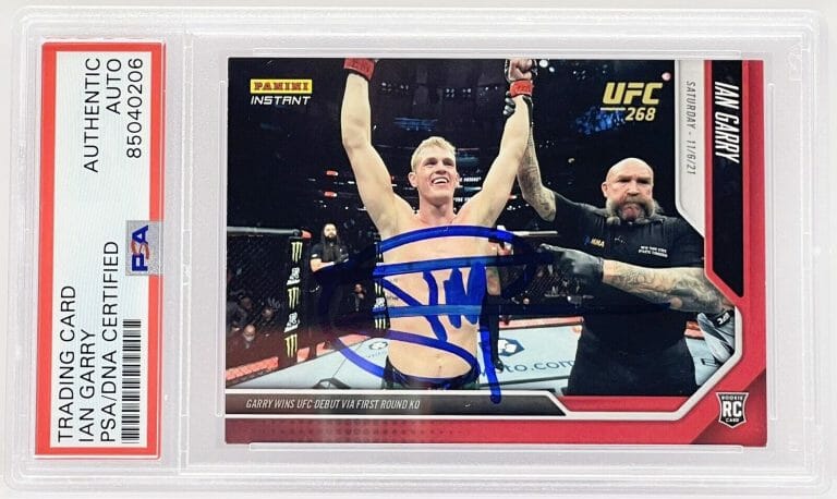 IAN GARRY SIGNED 2021 PANINI INSTANT ROOKIE CARD ON CARD UFC PSA/DNA SLABBED
 COLLECTIBLE MEMORABILIA