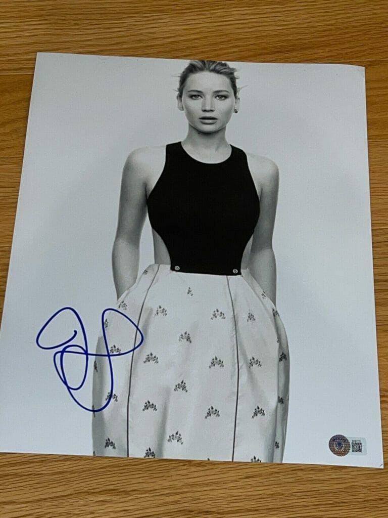 JENNIFER LAWRENCE SIGNED AUTOGRAPH 11×14 SEXY DIOR BABE HUNGER GAMES BECKETT BAS
 COLLECTIBLE MEMORABILIA