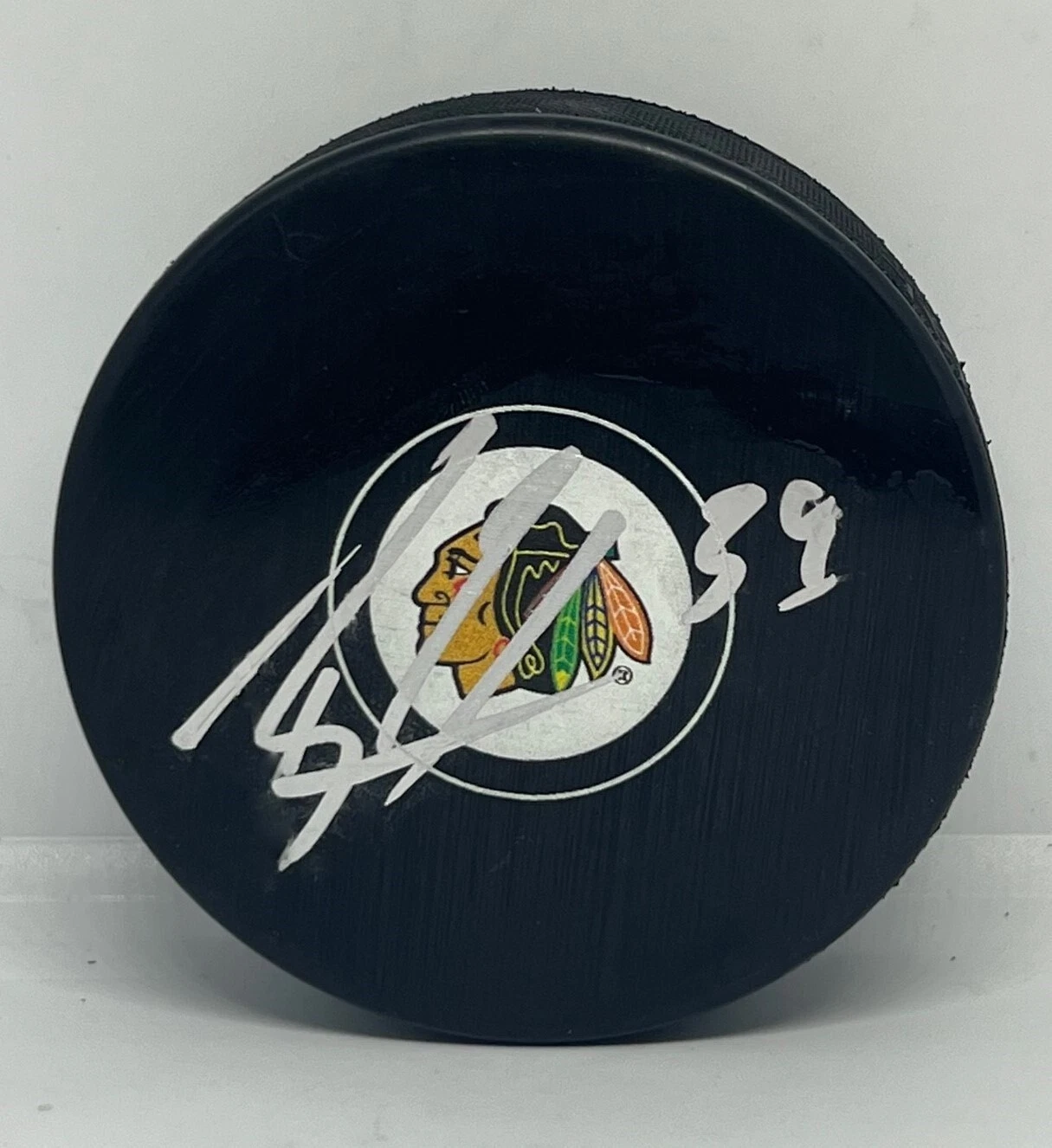 Brandon Hagel signed Chicago Blackhawks Logo Puck autographed Hawks Beckett

