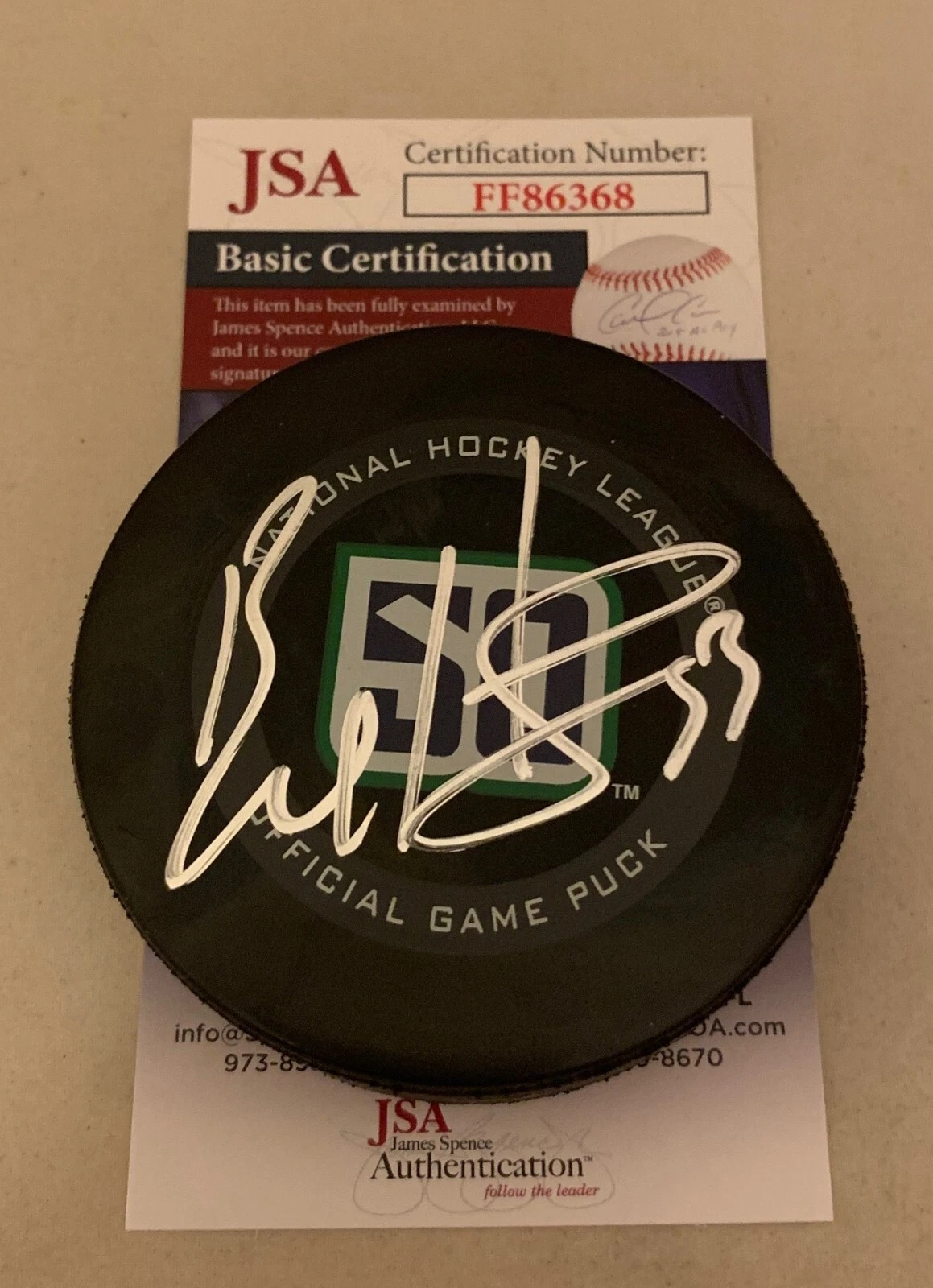 Bo Horvat signed Vancouver Canucks 50th Anniversary Official Game Puck JSA
