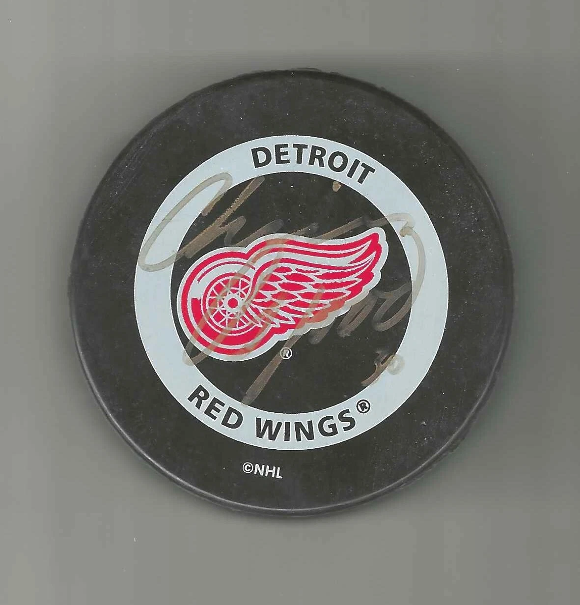 Chris Osgood Signed Detroit Red Wings Official Game Puck Signed In Gold
