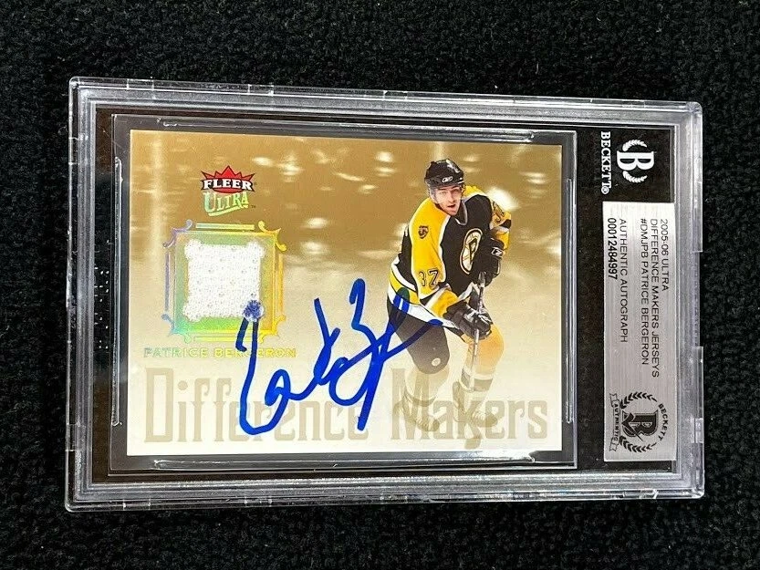Patrice Bergeron Signed 2005/06 Fleer Ultra Difference Makers Card BAS Certified
