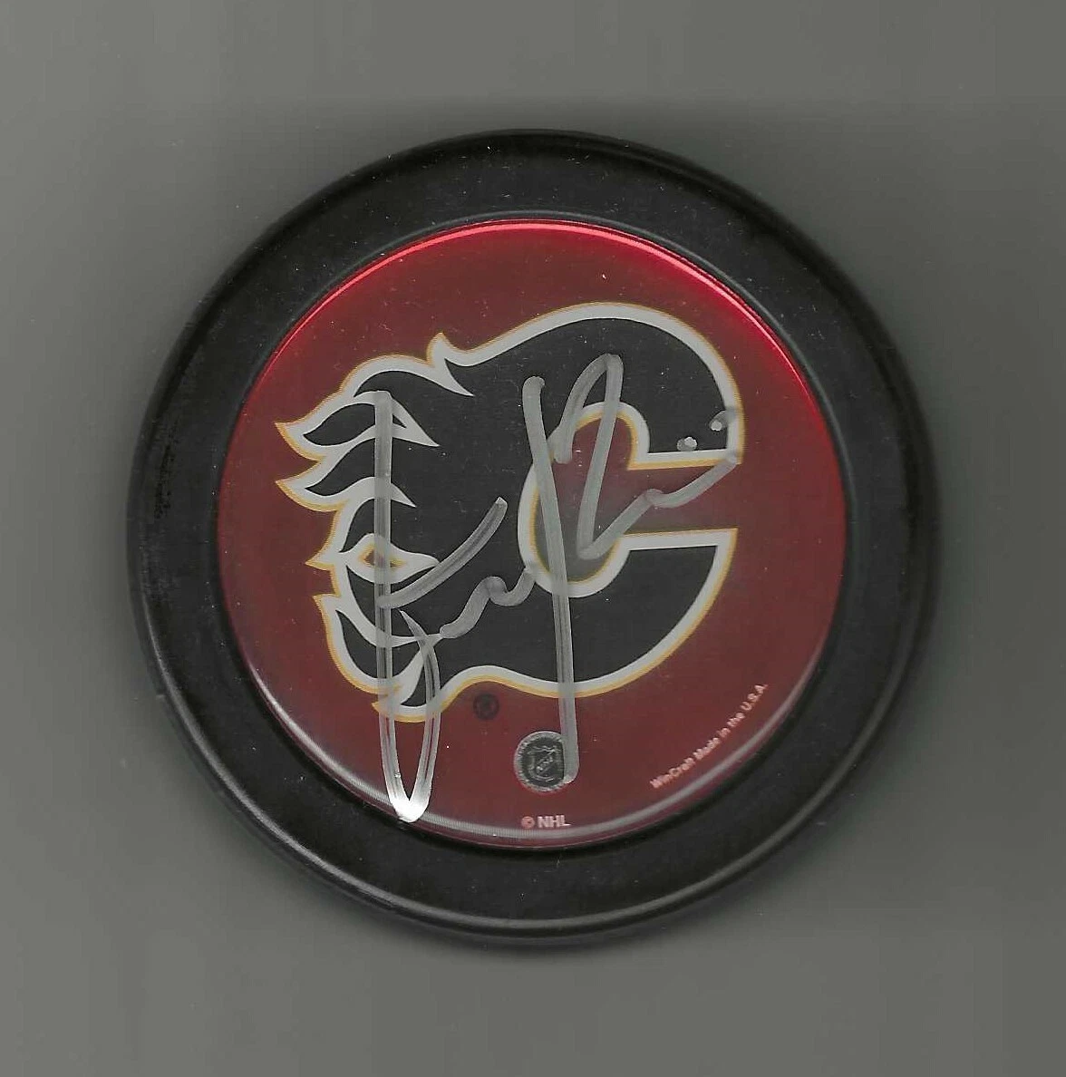 Emile Poirier Signed Calgary Flames Souvenir Puck
