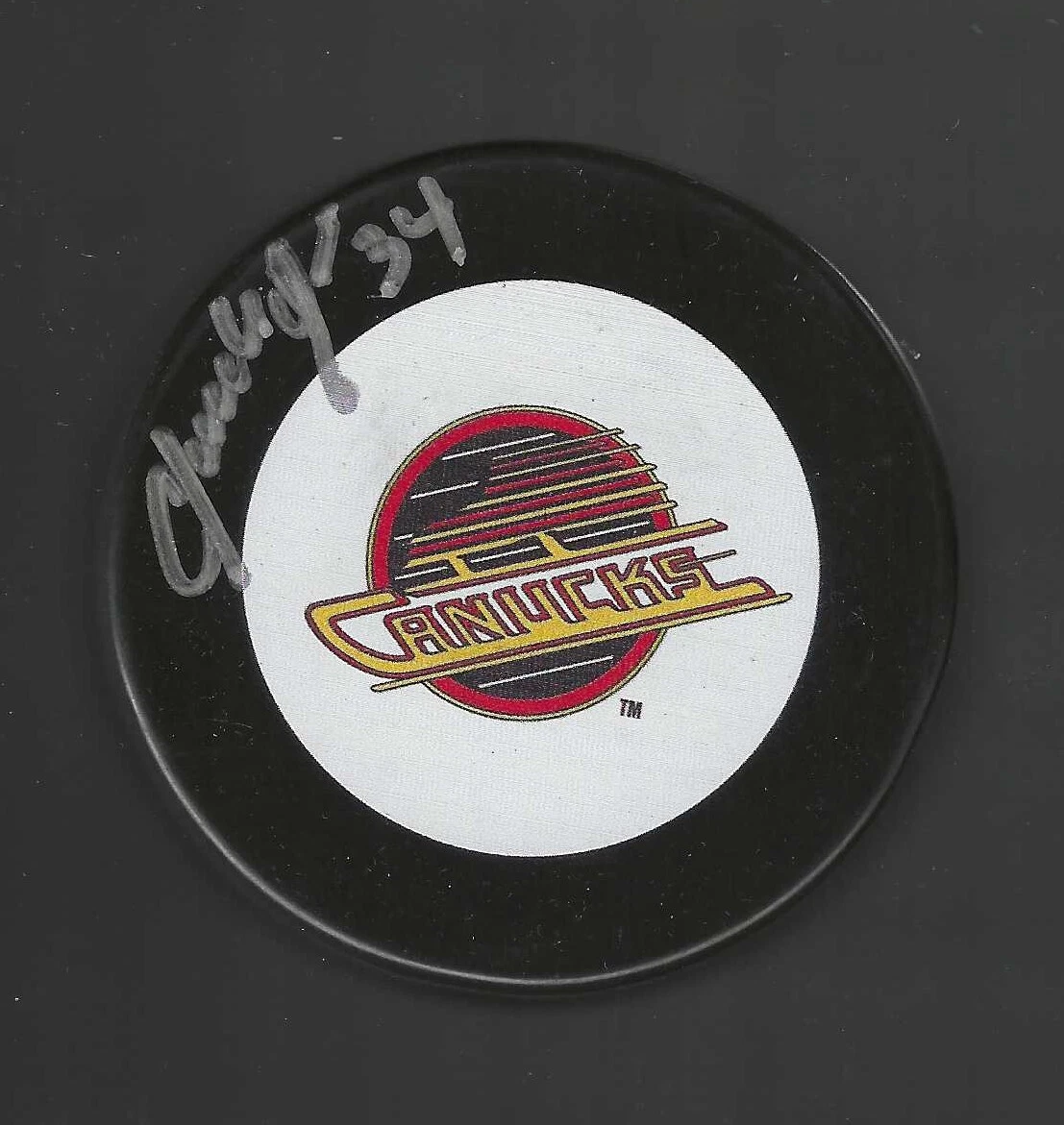 Claude Vilgrain Signed Vancouver Canucks Puck
