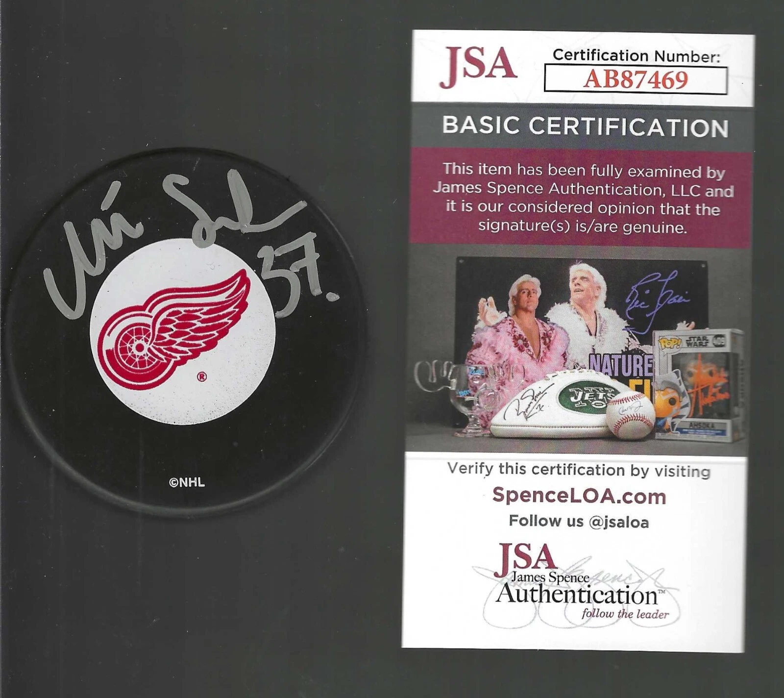 Mikael Samuelsson Signed Detroit Red Wings Puck JSA COA
