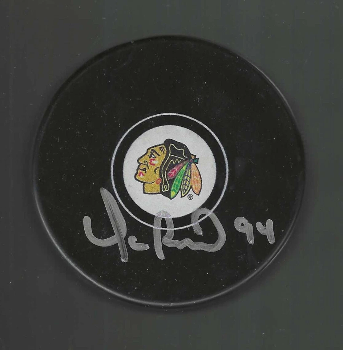 YANIC PERREAULT SIGNED CHICAGO BLACKHAWKS PUCK COLLECTIBLE MEMORABILIA