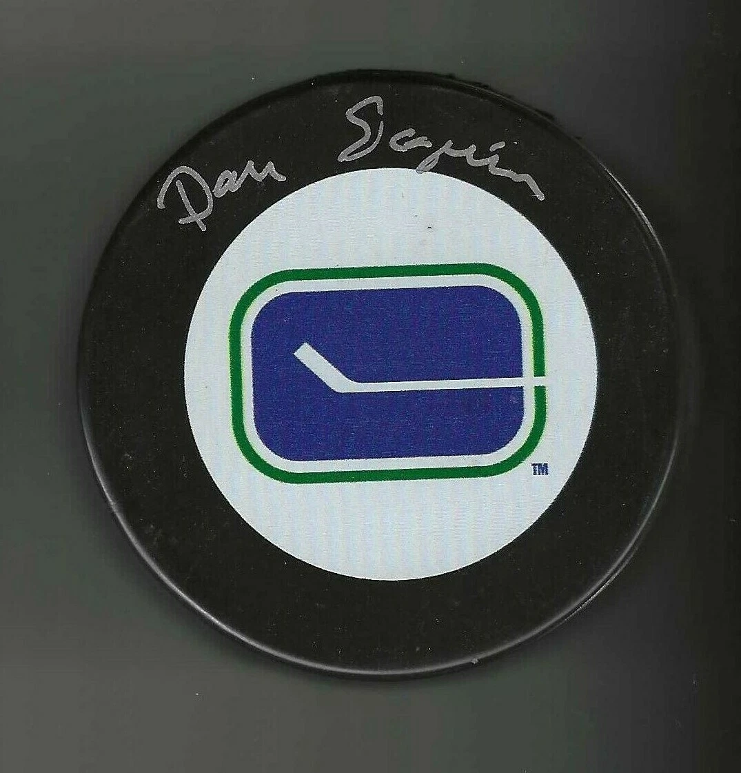 Dan Seguin Signed Vancouver Canucks Vintage Logo Puck
