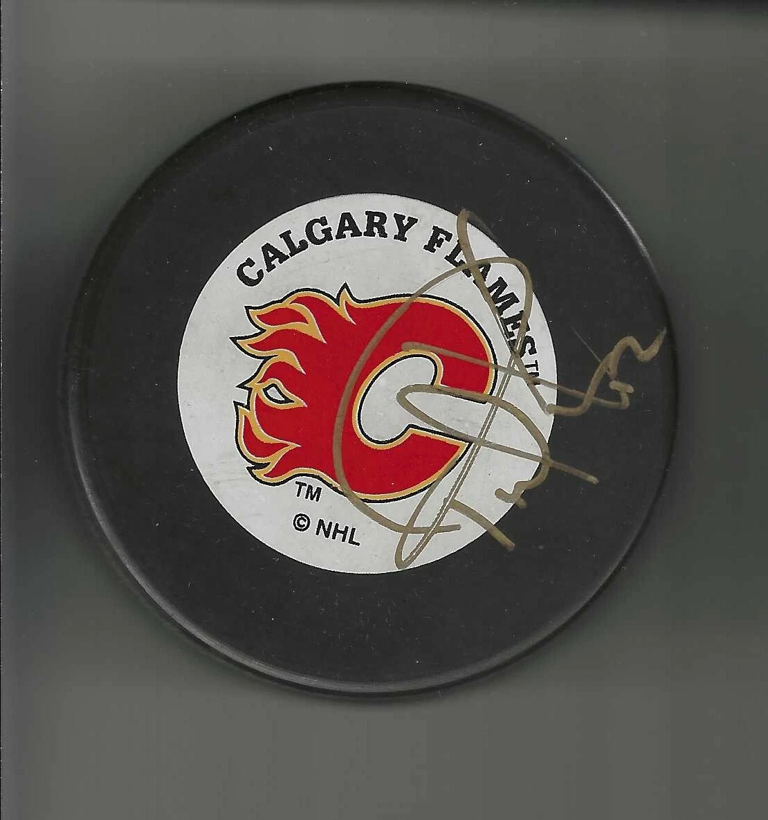 Paul Kruse Signed Calgary Flames Trench Puck
