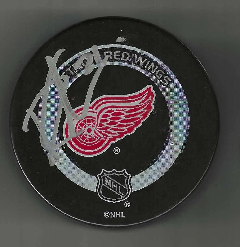 Dennis Cholowski Signed Detroit Red Wings Official Game Puck #2 Seattle Kraken
