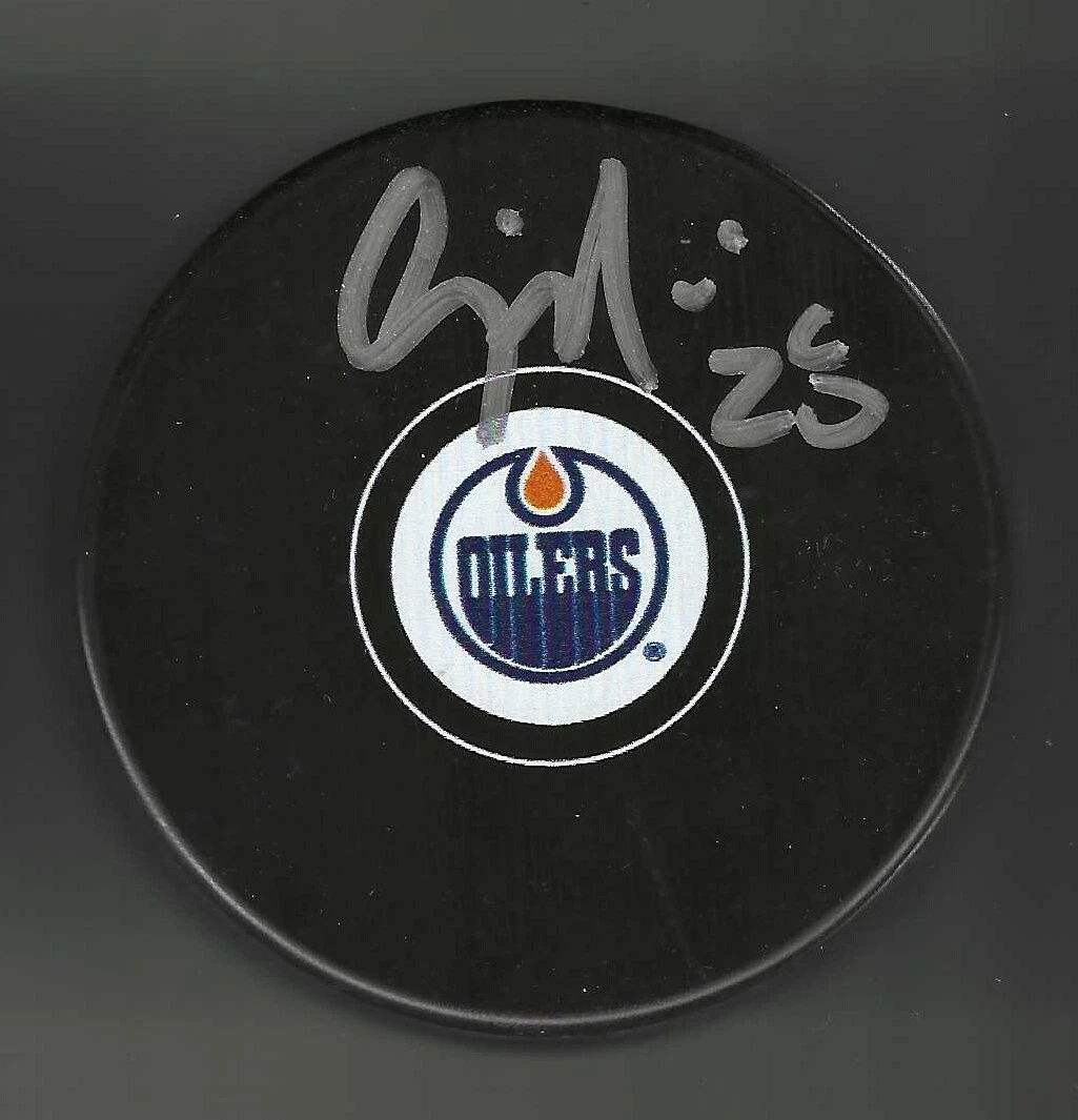 Craig Muni Signed Edmonton Oilers Puck
